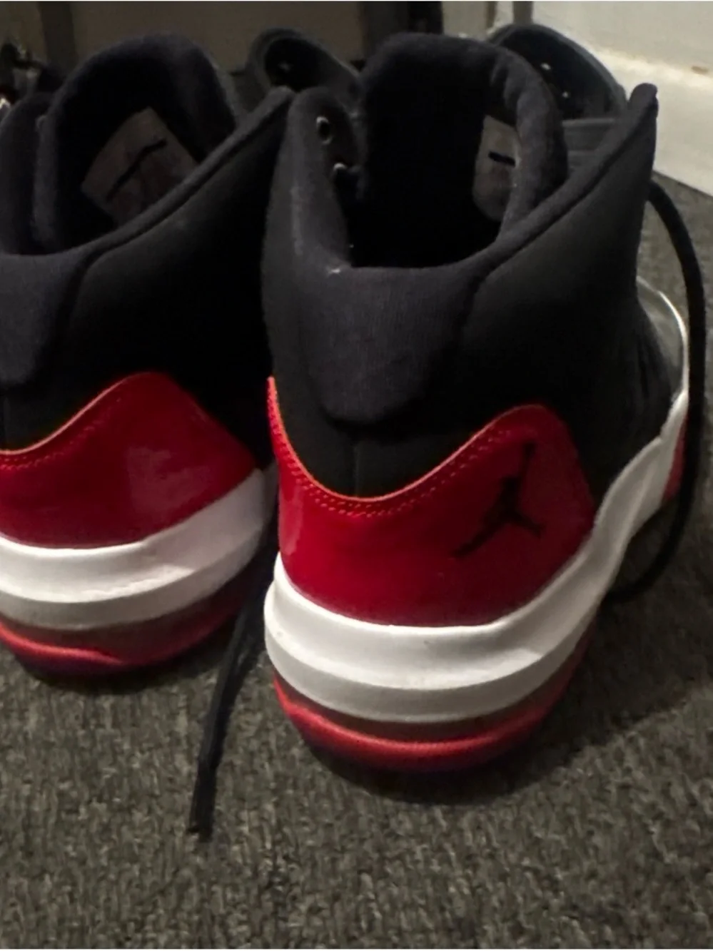 Black and Red Basketball Sneakers with Jumpman Logo